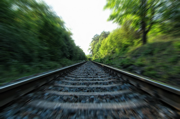 Thinking Exercise: Children Playing on Train Tracks